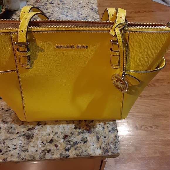 Medium size Mustard colored MK purse - Picture 3 of 4